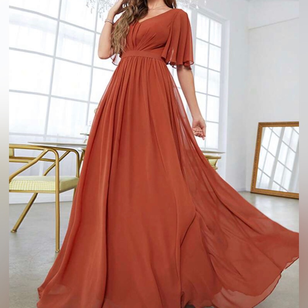 Rust orange bridesmaid dress. Only worn once in perfect condition.
